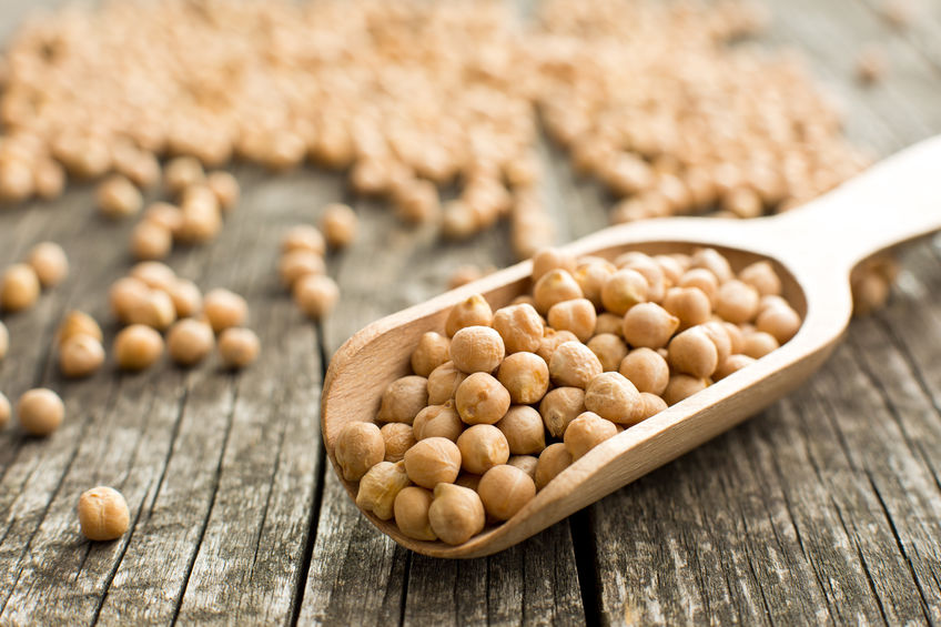 uncooked chickpeas in scoop